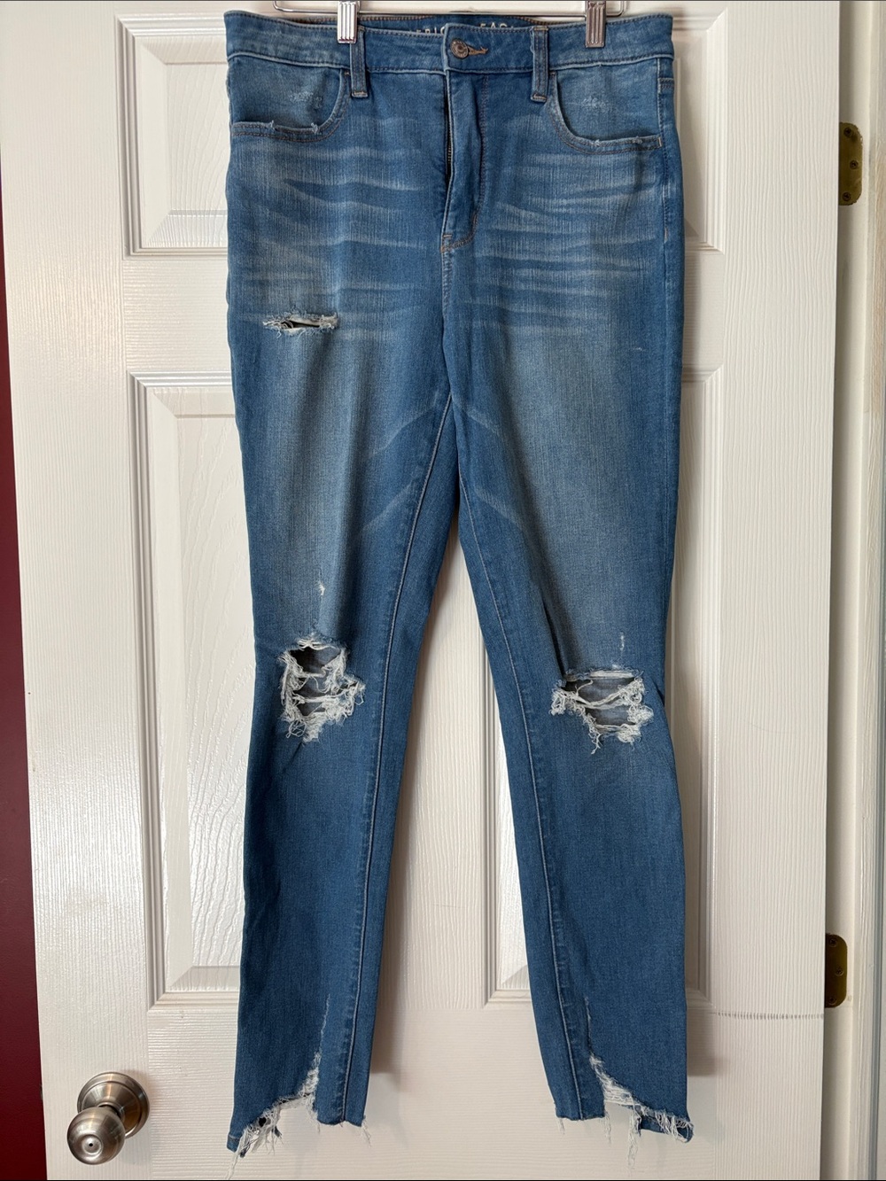 American Eagle Outfitters Distressed Skinny Jeans in Medium Blue